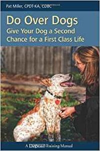 Cover of the book Do Over Dogs by Pat Miller has a dog and Pat sitting close to it with her head close to it training with a green lawn in the background